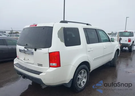 2011 Honda Pilot Touring z USA, uszkodzony, nr VIN 5FNYF4H91BB085186